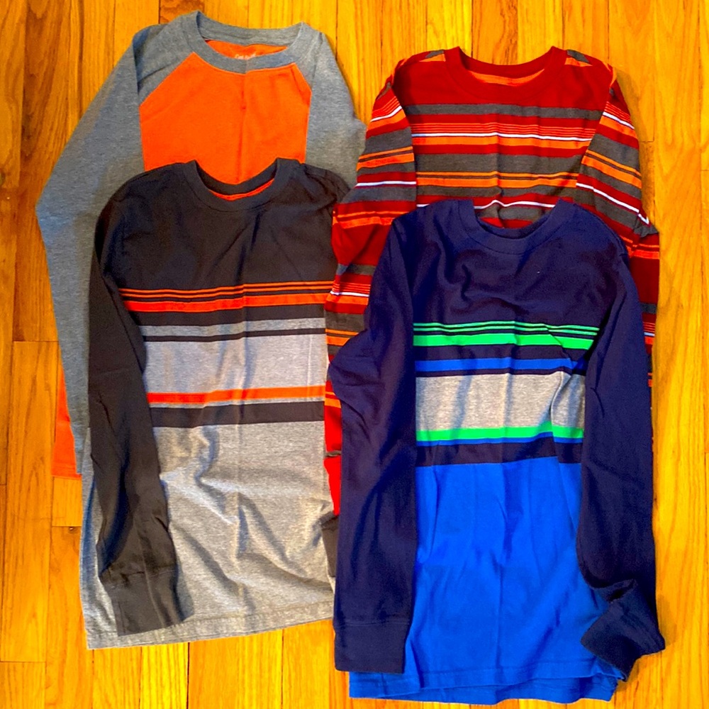 4 long sleeve light weight t-shirts. Size 12/14